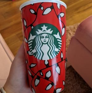Starbucks holiday tumbler lights red cup coffee